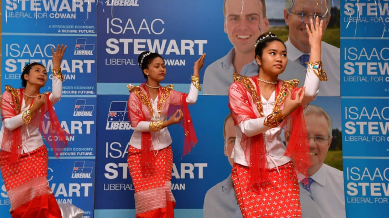 Traditional dancers from Myanmar perform for Prime Minister Scott Morrison and Liberal candidate for Cowan Issac Stewart at a multicultural event at Koondoola, 25km north of Perth, Tuesday, April 30, 2019. (AAP Image/Mick Tsikas) NO ARCHIVING