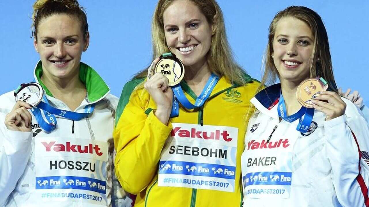 Emily Seebohm celebrates her gold medal.