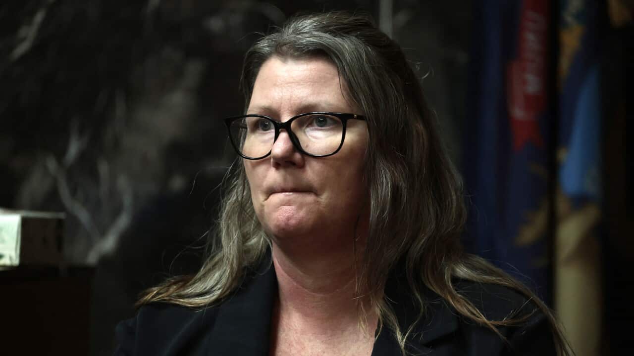 A woman wearing glasses