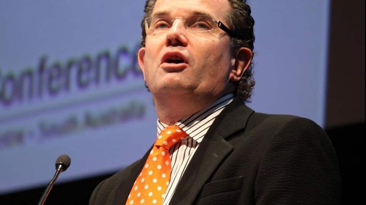 APA Group chairman Michael Fraser at lectern