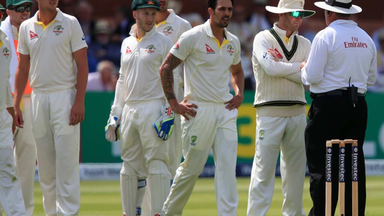 Australia captain Michael Clarke speaks with Umpire Marais Erasmus