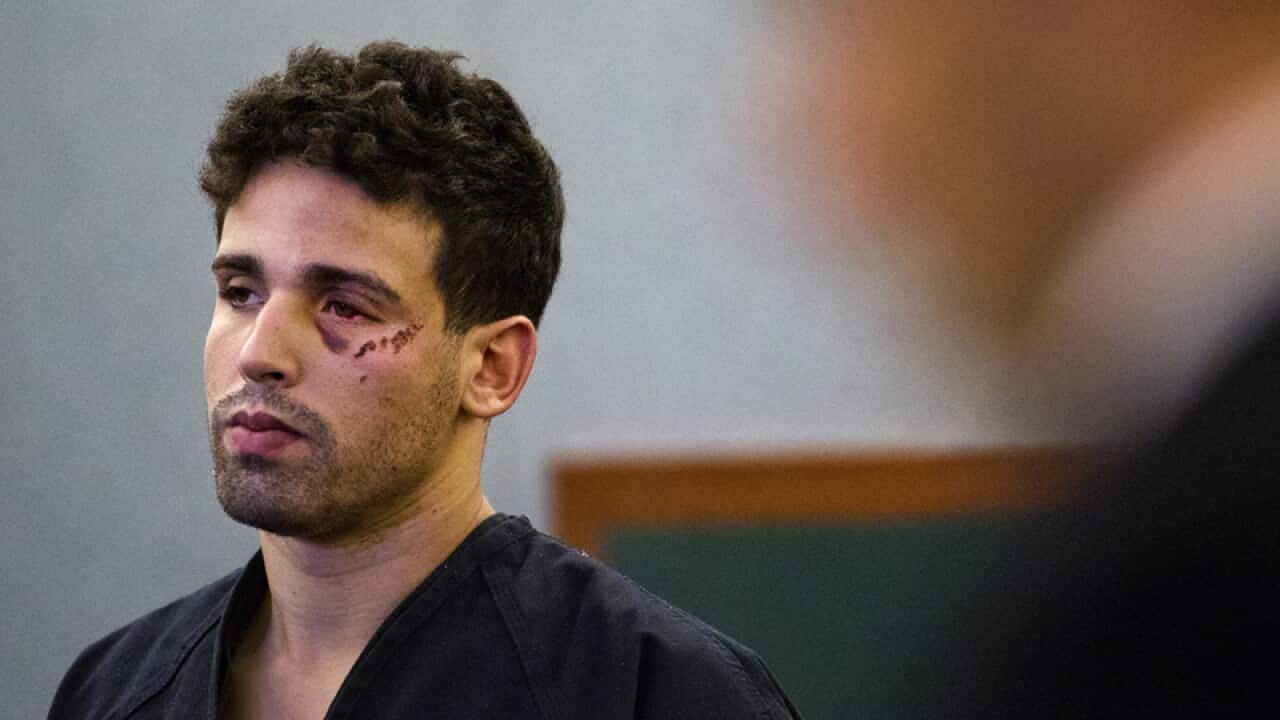 Joey Kadmiri awaits his arraignment in a Las Vegas court.