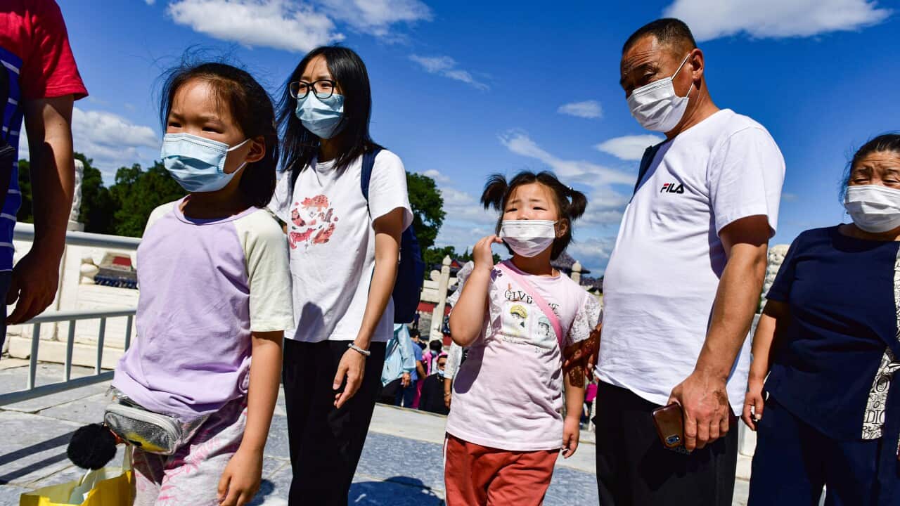 A family seen during the festival at the temple of Heaven