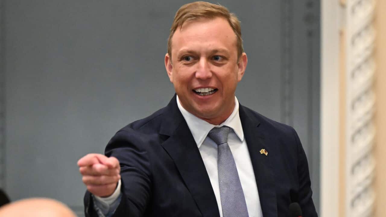 A man standing and pointing