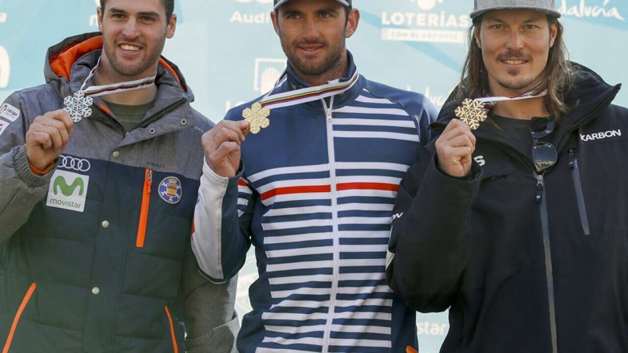 Australian snowboarder Alex Pullin (R)