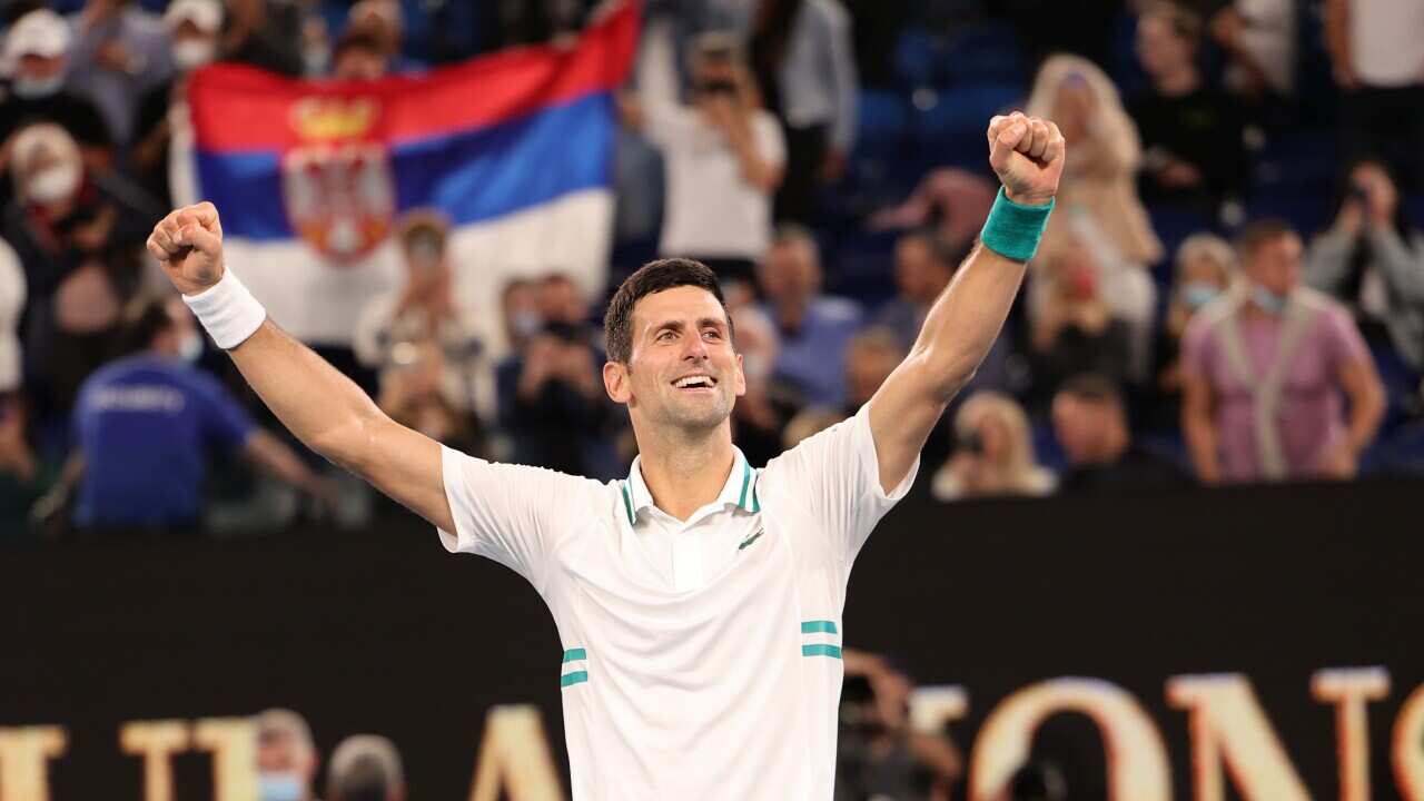 Novak Djokovic of Serbia celebrates after defeating 4th seed Daniil Medvedev in the 2021 Australian Open in Melbourne