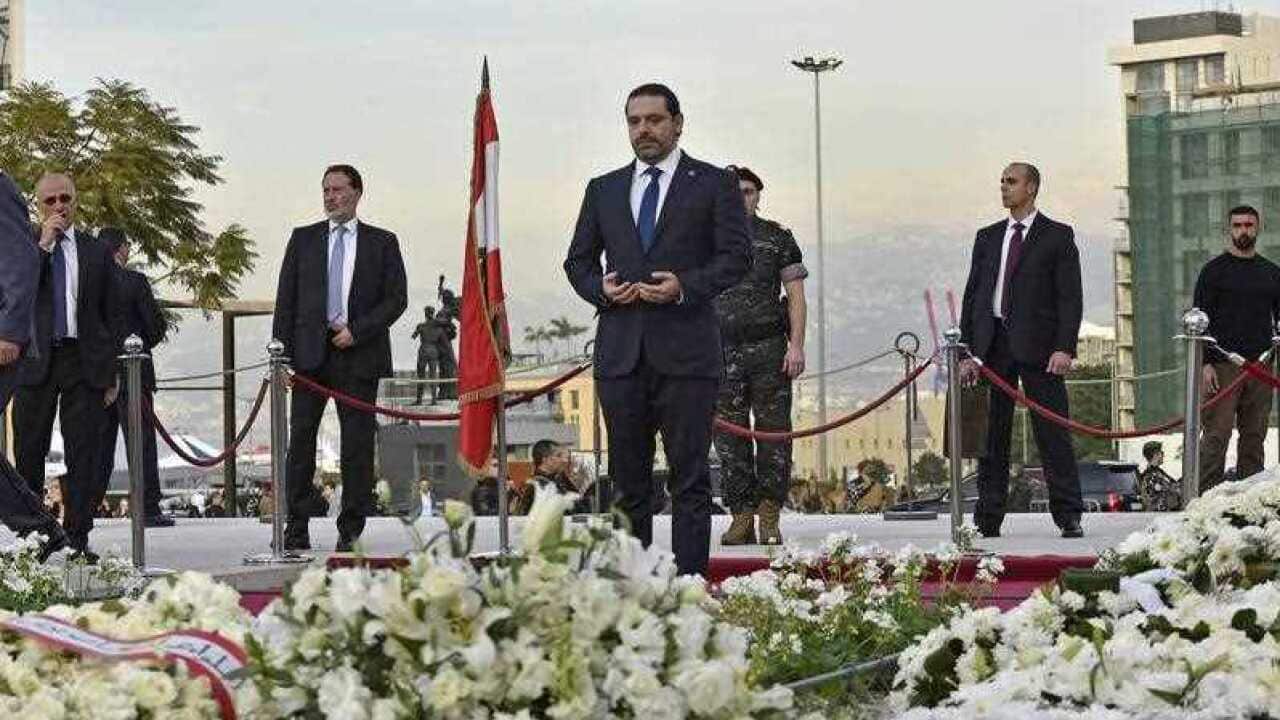 Lebanese Prime Minister Saad Hariri visits the grave of his father, late Prime Minister Rafik Hariri, in Beirut.
