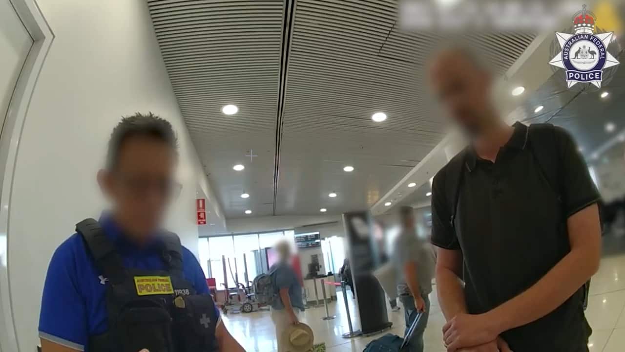 Investigator talking with accused