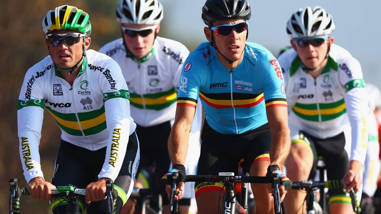 Simon Gerrans of Australia (l) rides with Philippe Gilbert (r) of Belgium during training for the UCI World Road Race Championships on September 25, 2014 in Ponferrada