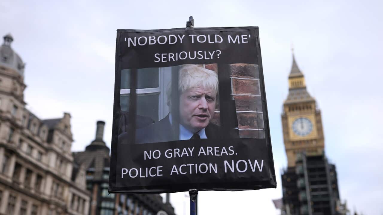 A protestor in Parliament Square, London