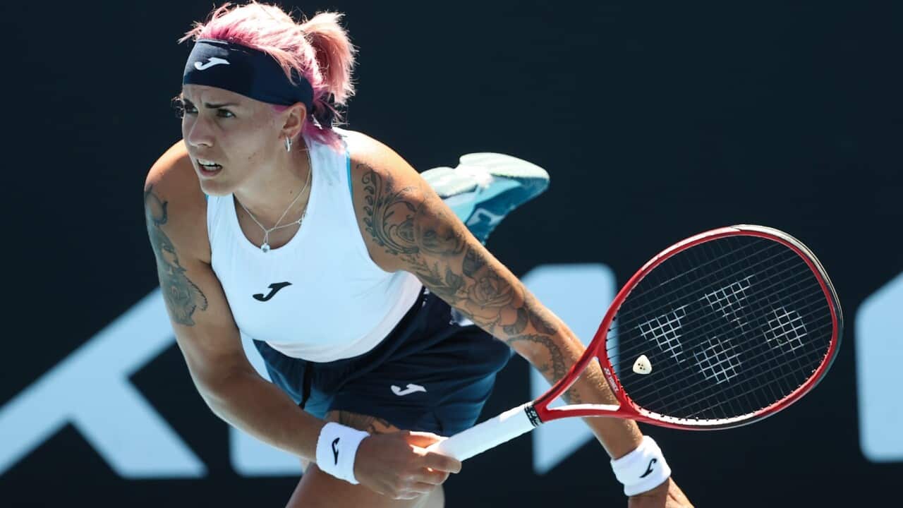 Spain's Aliona Bolsova serves to United States' Jennifer Brady during their first round match at the Australian Open tennis championship in Melbourne, Australia, Tuesday, Feb. 9, 2021.