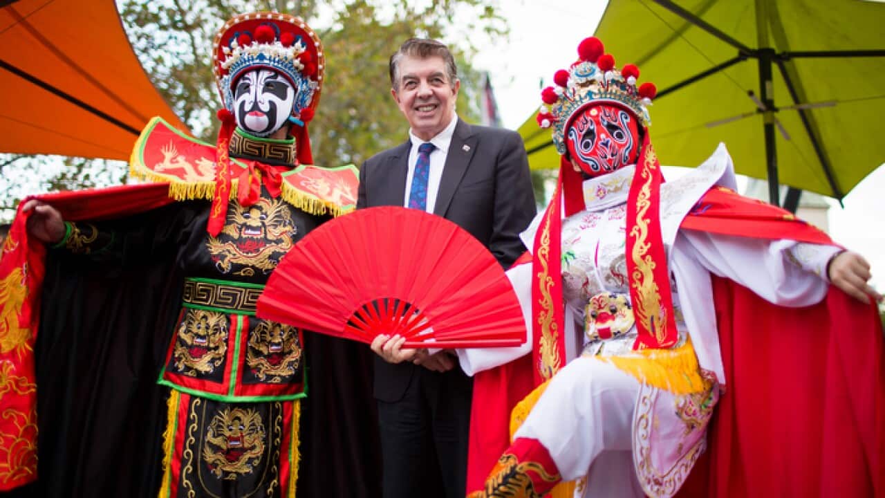 Minister for Multiculturalism Ray Williams (centre) is seen with participants ahead of the 2019 Parramasala Festival Parade in Sydney,