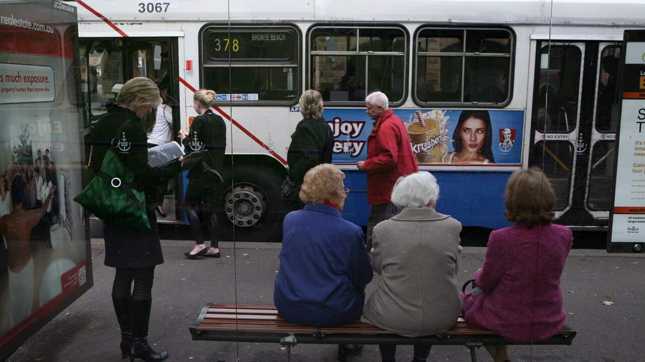 Elderly women wait to catch a bus on Eddy Avenue near Central Station in Sydney, Wednesday, June 1, 2011. (AAP Image/Angela Brkic) NO ARCHIVING