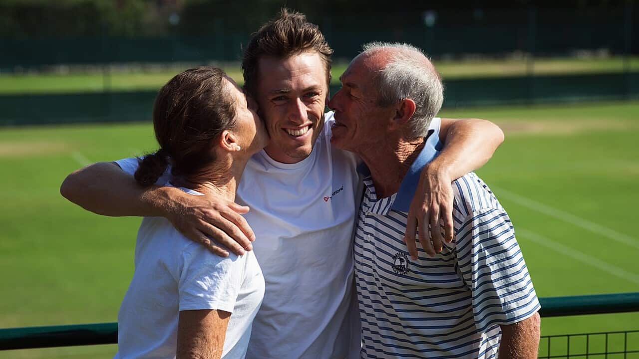 John Millman with parents Shona and Ron Millman at Wimbledon.