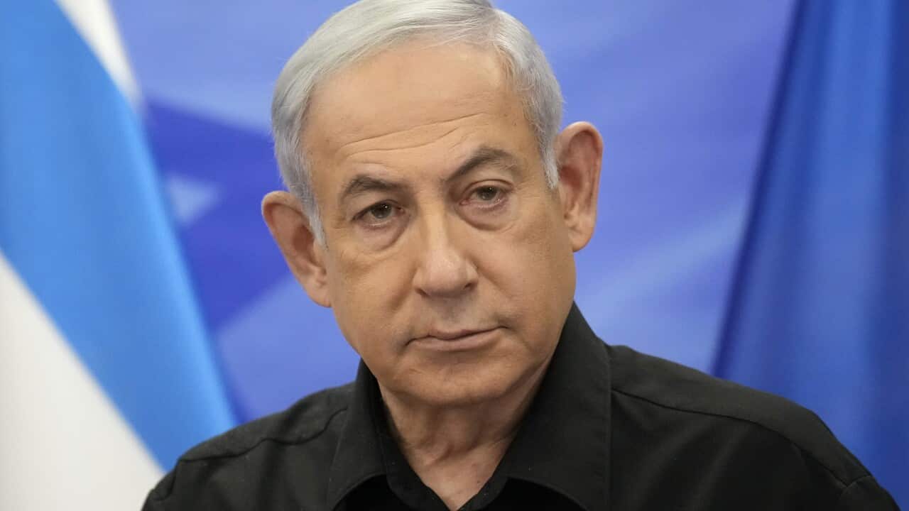 A man wearing a black shirt