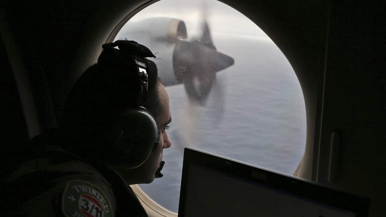 Flight officer Rayan Gharazeddine on board a Royal Australian Air Force AP-3C Orion, searches for the missing Malaysia Airlines Flight MH370 