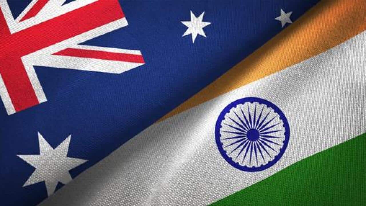 Stranded Australian launches legal action against the government's controversial India travel measures.