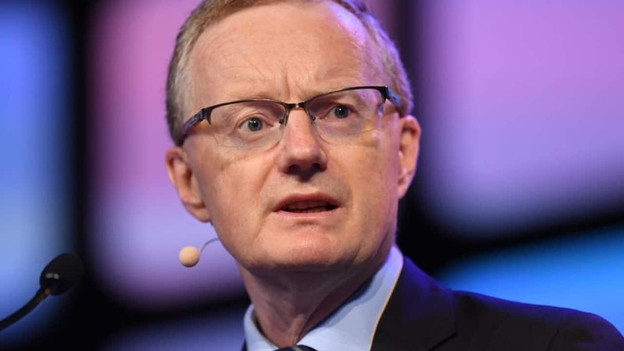 Philip Lowe speak on stage.