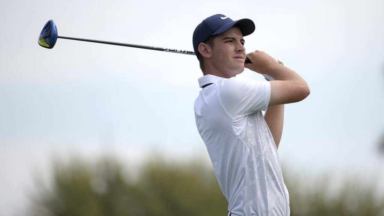 Ryan Ruffels, of Australia, watches his tee shot