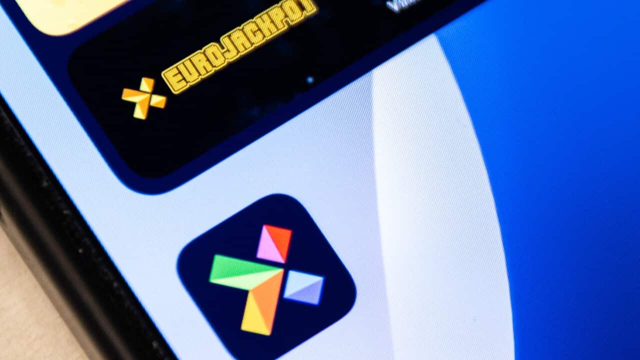 The colourful logo of the Norwegian lottery company Norsk Tipping is displayed alongside the Eurojackpot logo on a smartphone screen.