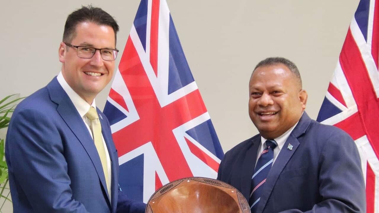 Fiji's Acting Foreign Affairs Minister Inia Seruiratu (right) welcomes Australia’s Minister for International Development and the Pacific  Zed Seselja.