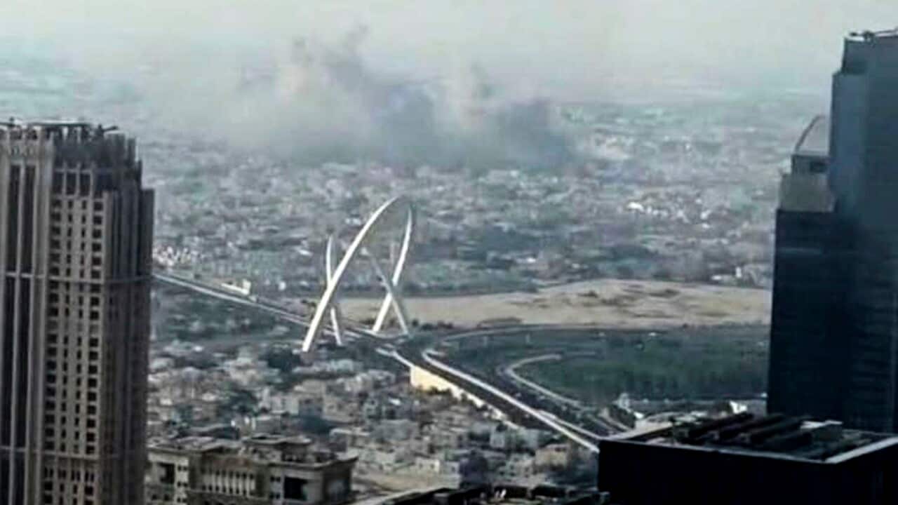 Smoke rises from an explosion caused by an Israeli strike, in Doha, Qatar (AAP)