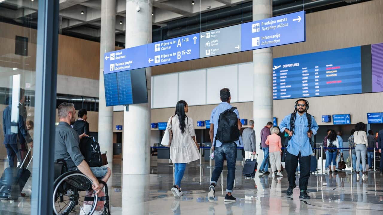Lovely Diverse Couple Traveling From The Airport