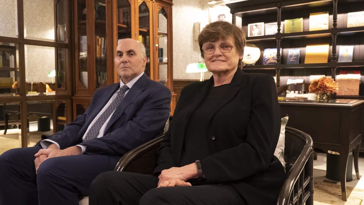 Drew Weissman and Katalin Karikó sitting down on chairs