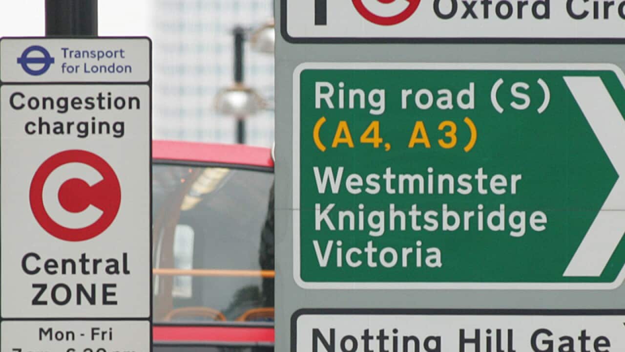 Road signs warning about motorists entering London's Congestion Zone.
