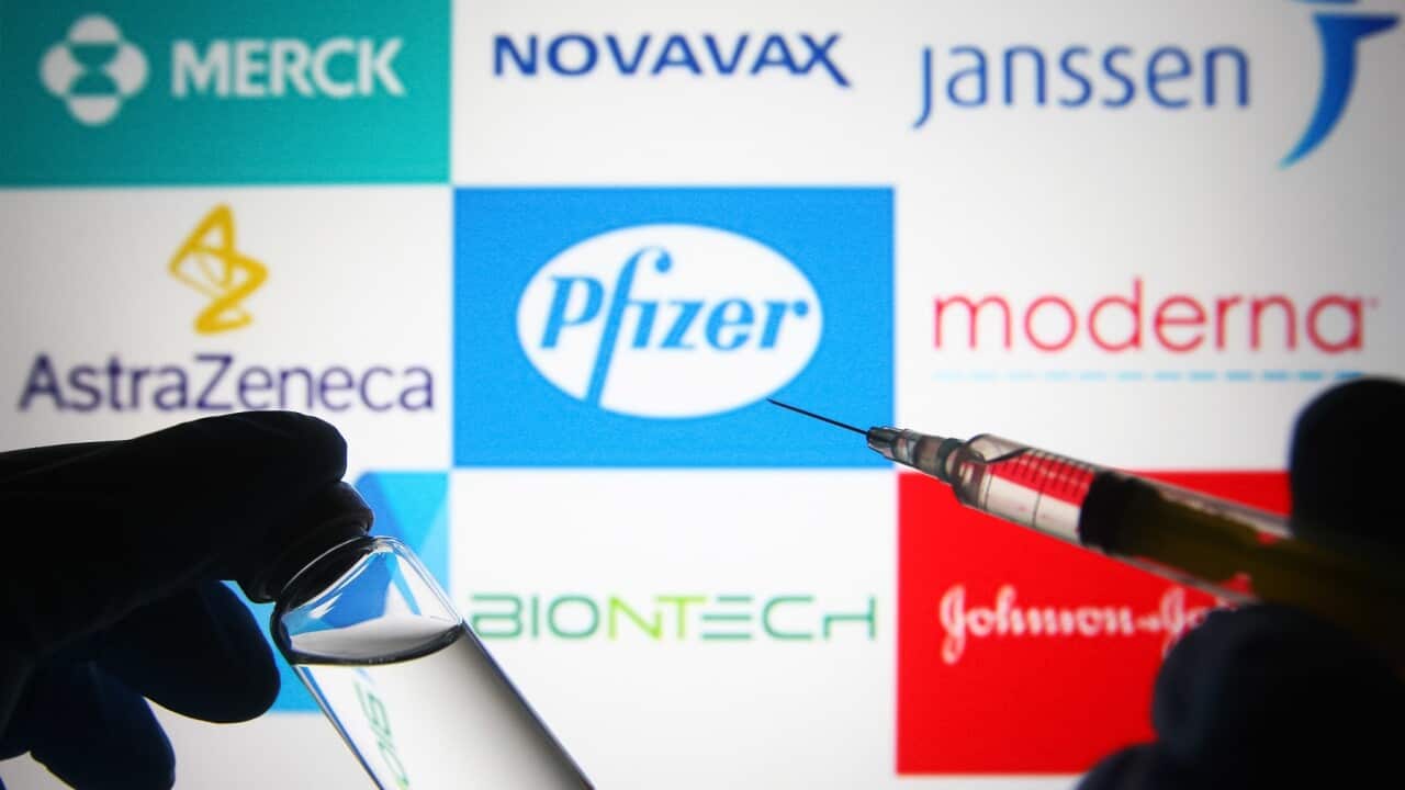 In this photo illustration, silhouette of hands in medical gloves hold a medical syringe and a vial in front of Pfizer,Biontech,AstraZeneca,Moderna,Johnson & johnson,Novavax,Merck and Janssen logos. (Photo by Pavlo Gonchar / SOPA Images/Sipa USA)