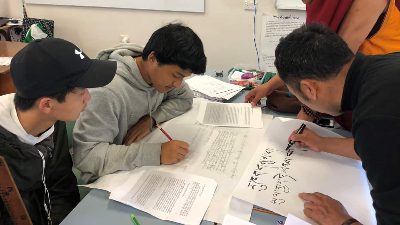 Teachers with students