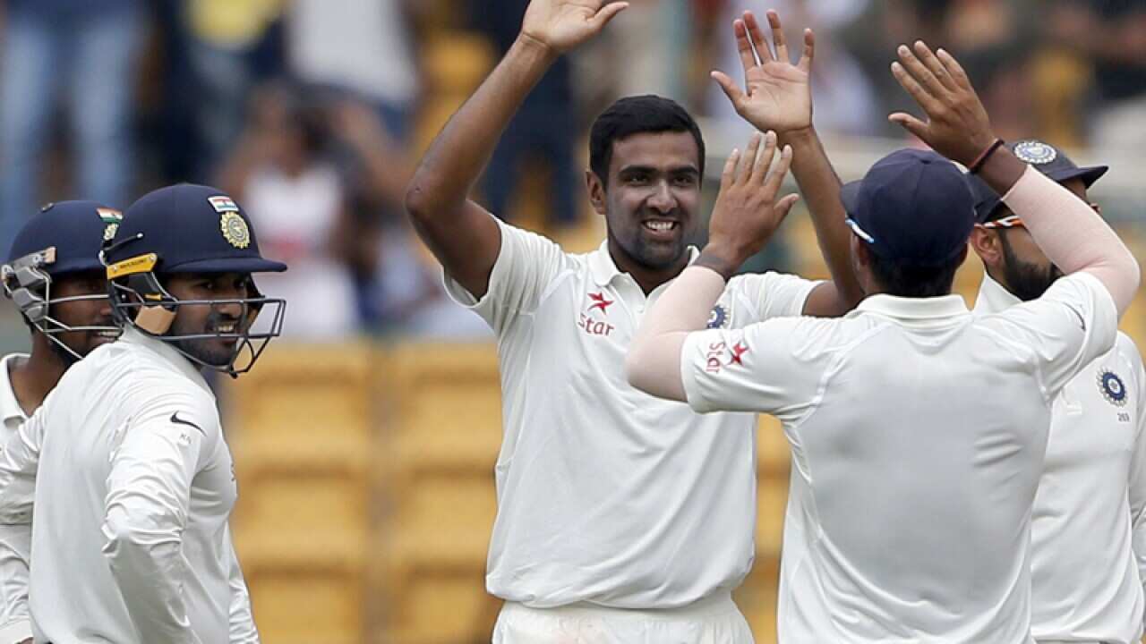 India's Ravichandran Ashwin, facing camera, celebrates