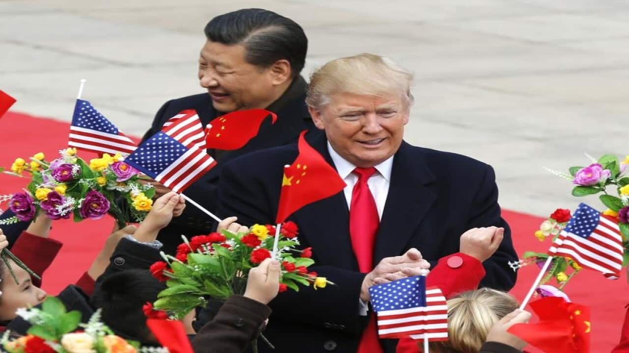 Donald Trump and Chinese President Xi Jinping discussed trade and North Korea in Beijing.