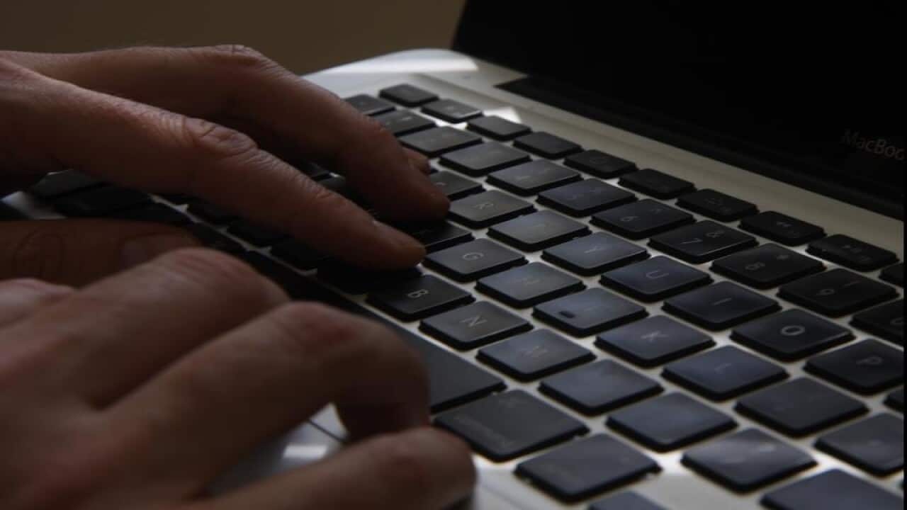 A man using a laptop