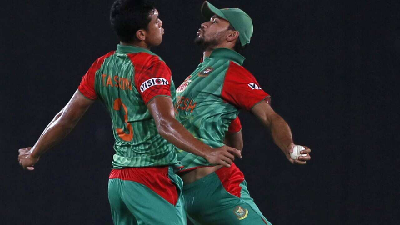 Bangladesh’s Taskin Ahmed (L) and captain Mashrafe Mortaza