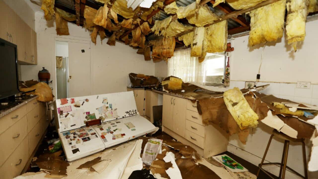 Damage and destruction in Pauline Cambourne's Dungog home caused by flooding in the NSW Hunter region, Wednesday, April 22, 2015.(AAP Image/Nikki Short)