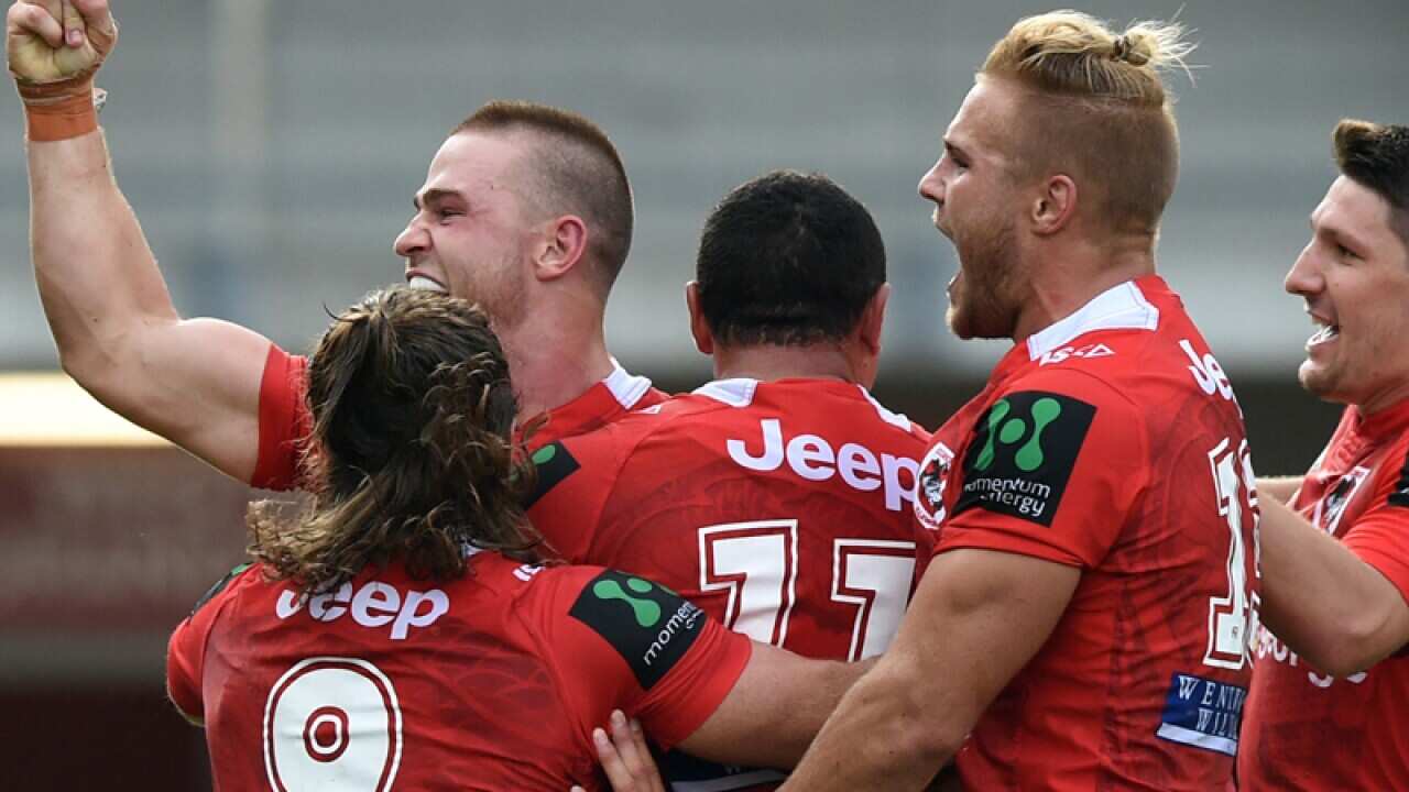 St George Illawarra's Euan Aitken (L) celebrates after scoring a try