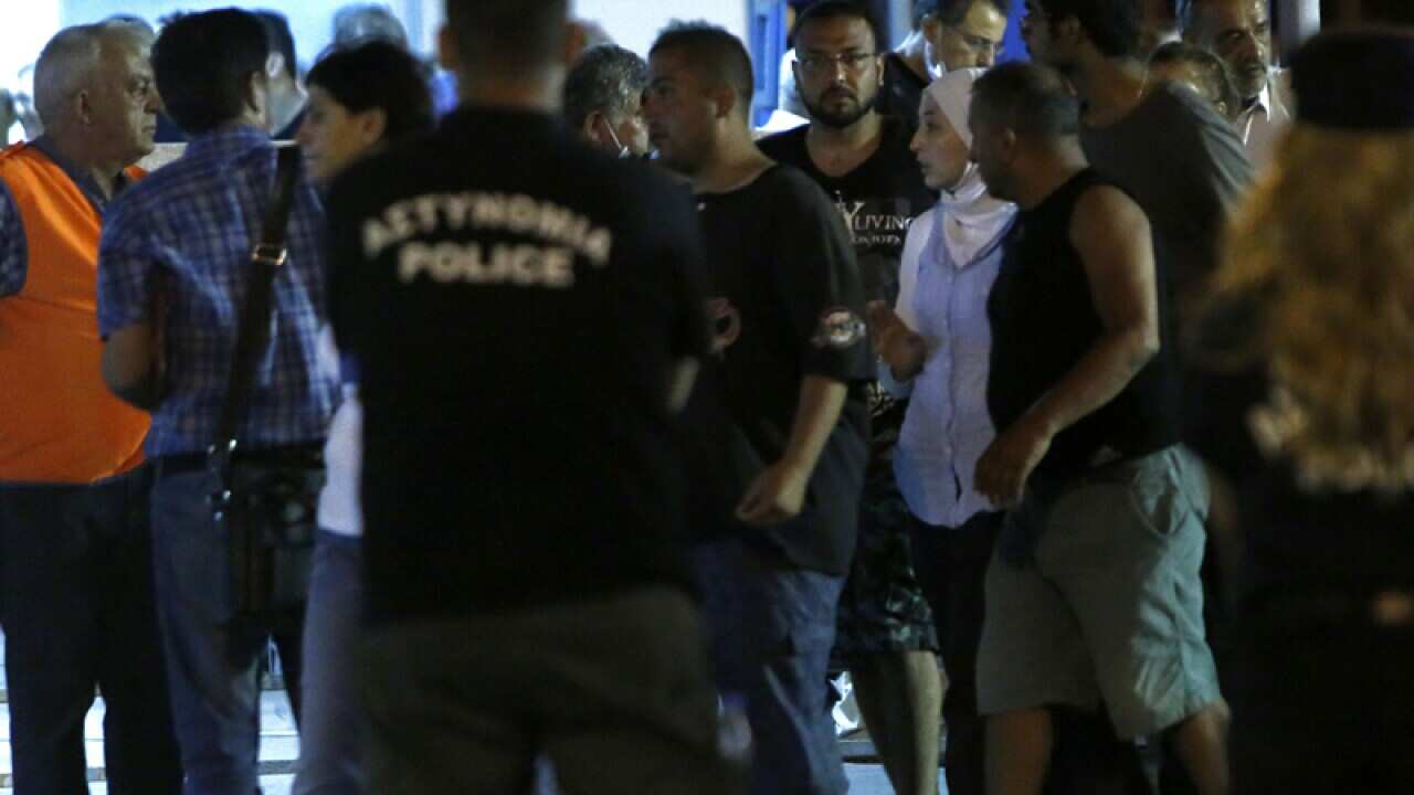 A group of migrants after being rescued off the coast of Cyprus
