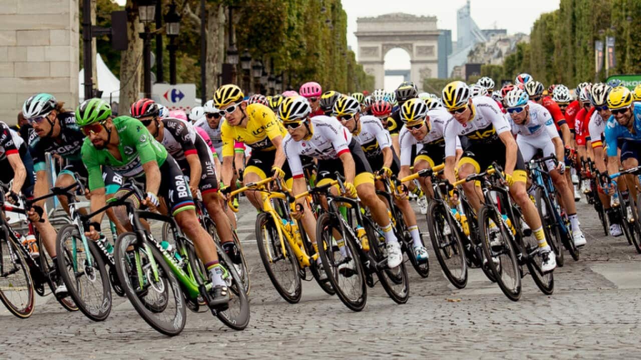 Geraint Thomas in the yellow jersey on the Champs-Elysees