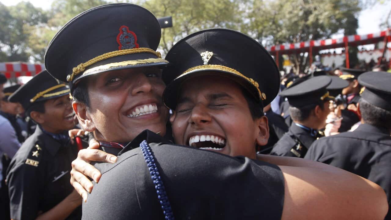 Cadets celebrate after graduating at the Indian Army's Officer Training Academy in Chennai