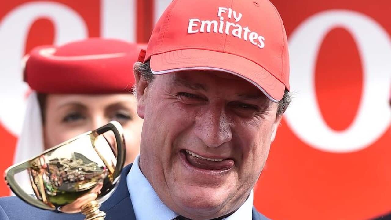 Trainer Darren Weir celebrates winning the 2015 Melbourne Cup.
