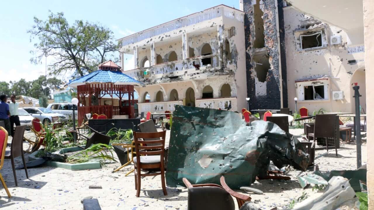 A view of Asasey Hotel after an attack, in Kismayo, Somalia, Saturday July 13, 2019.