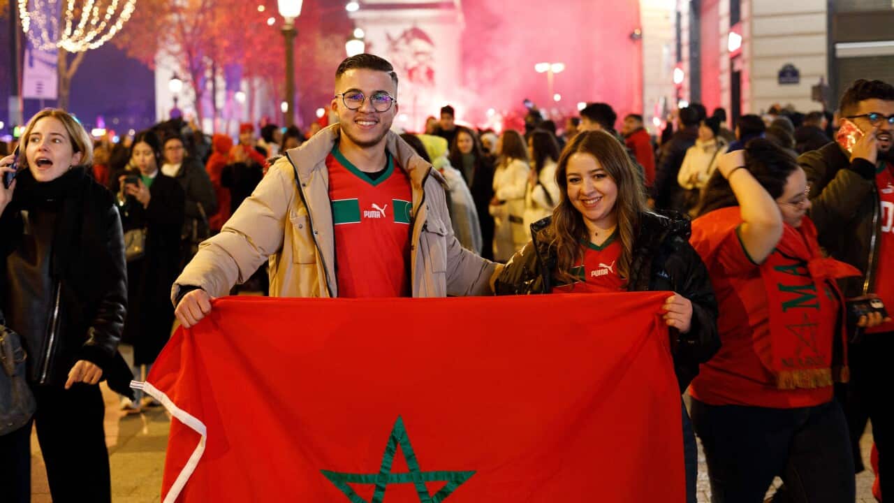 Morocco's Supporters Celebrate On The Avenue Des Champs-Elysees - Paris