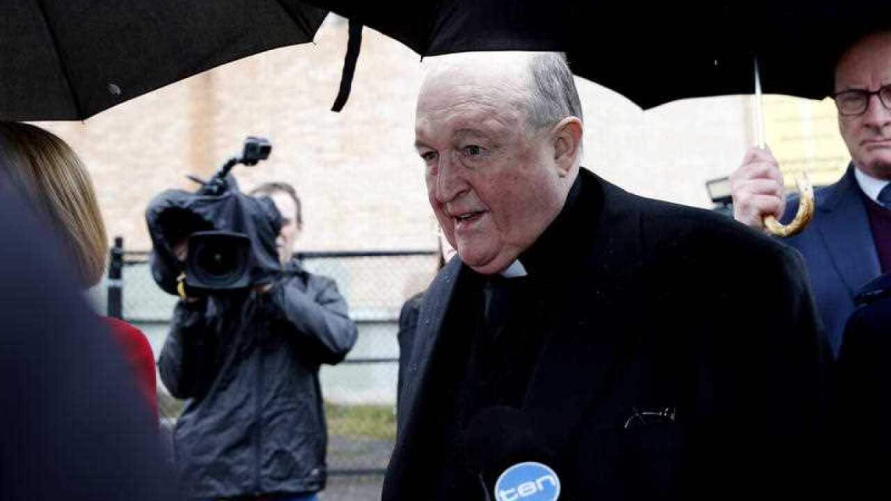 The Archbishop of Adelaide, Philip Wilson leaves Newcastle Local Court