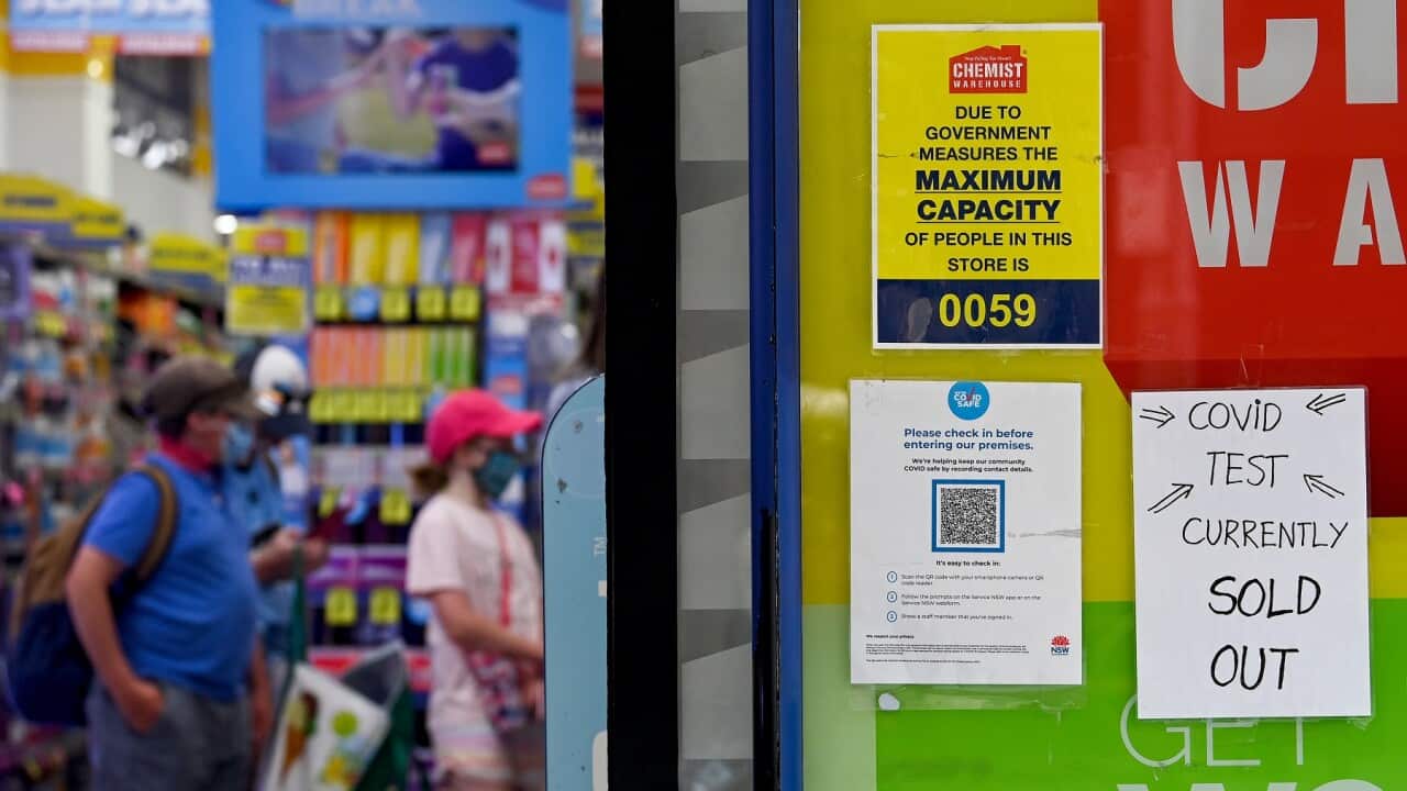 A sign on a chemist shop that Rapid Antigen Test kits are sold out