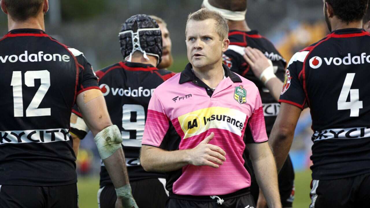 A Referee waits for the video ref decision