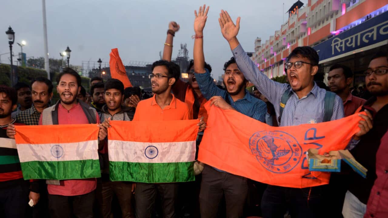 Activists celebrate India's reported air strike on a Jaish e Mohammed camp inside Pakistan
