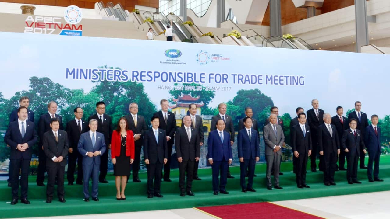 Officials who attended trade ministerial talks at the Asia-Pacific Economic Cooperation forum, pose for a photo in Hanoi, Vietnam, on May 20, 2017. (Kyodo)==Kyod