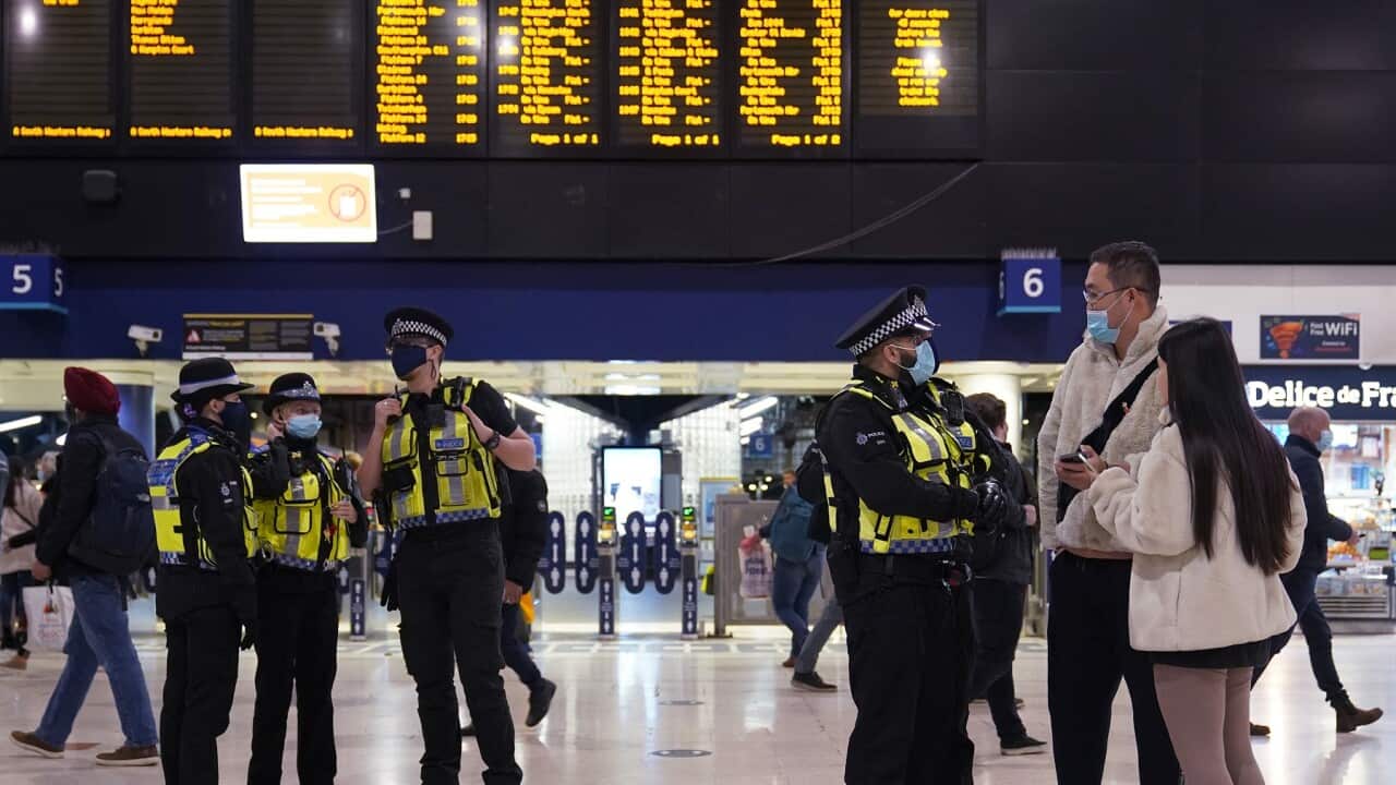 Police officers on patrol at Waterloo Station, London
