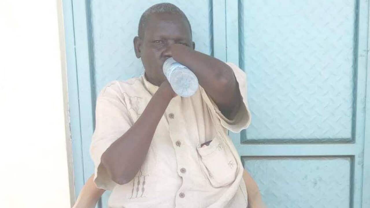 Koor Gai Gong trying to drink